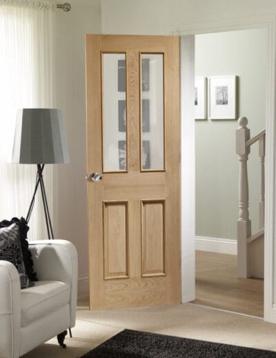 Malton With Raised Mouldings Internal Oak Door with Clear Bevelled Glass